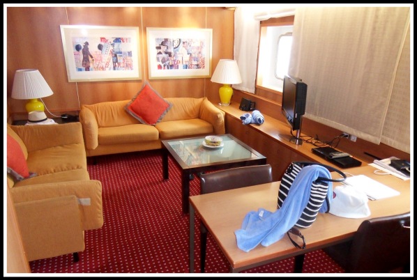 a photo of the lounge area in the suite