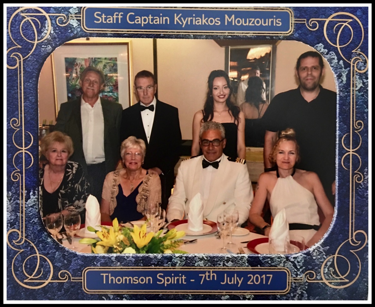 Me stood behind Sarah on the right of the photo stood in front of the staff captains table with 4 other people(including the captain who is sat next to Sarah)