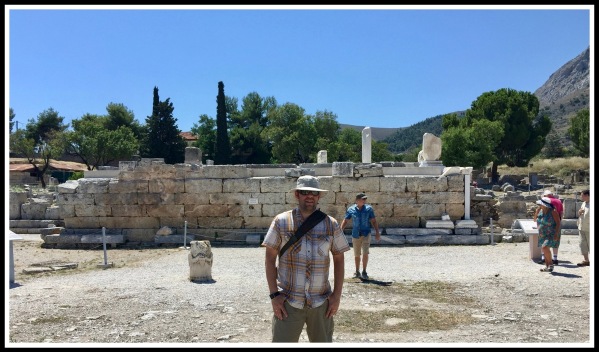 Me stood (centre) in front of the ruins of the Bema in ancient Corinth