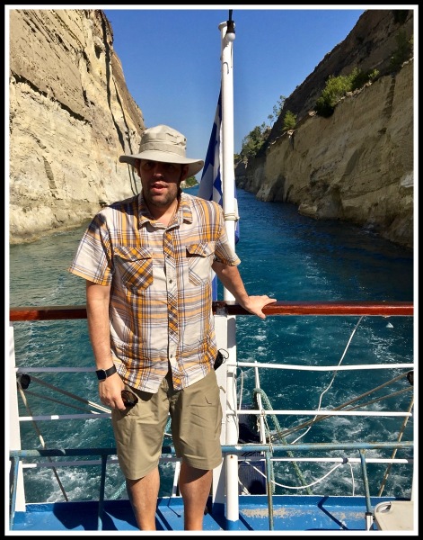 Me stood right at the rear of the boat with the beautiful Corinth canal in the background