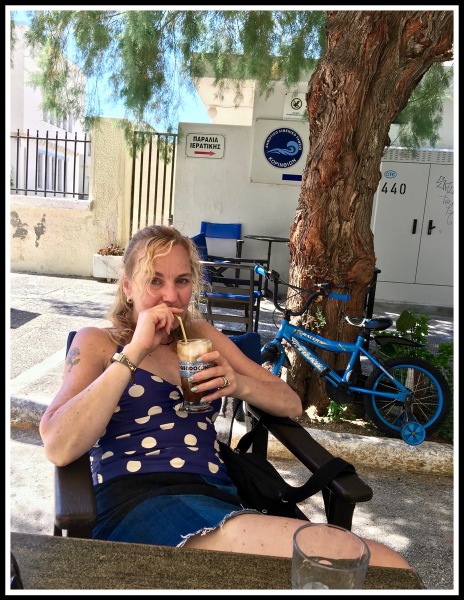 Sarah enjoying an iced Cappaccino outside the Cafe in Corinth