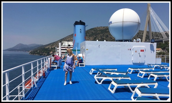 Sarah stood wearing her new Hokusai wave dress on the top deck of the Thomson Sirit  @ Dubrovnik 4.jpeg