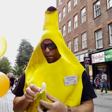 Me in a Banana suit eating a banana
