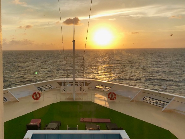A view of a sunset from our cabin on the Marella Explorer looking directly forward and centre at the front of the ship