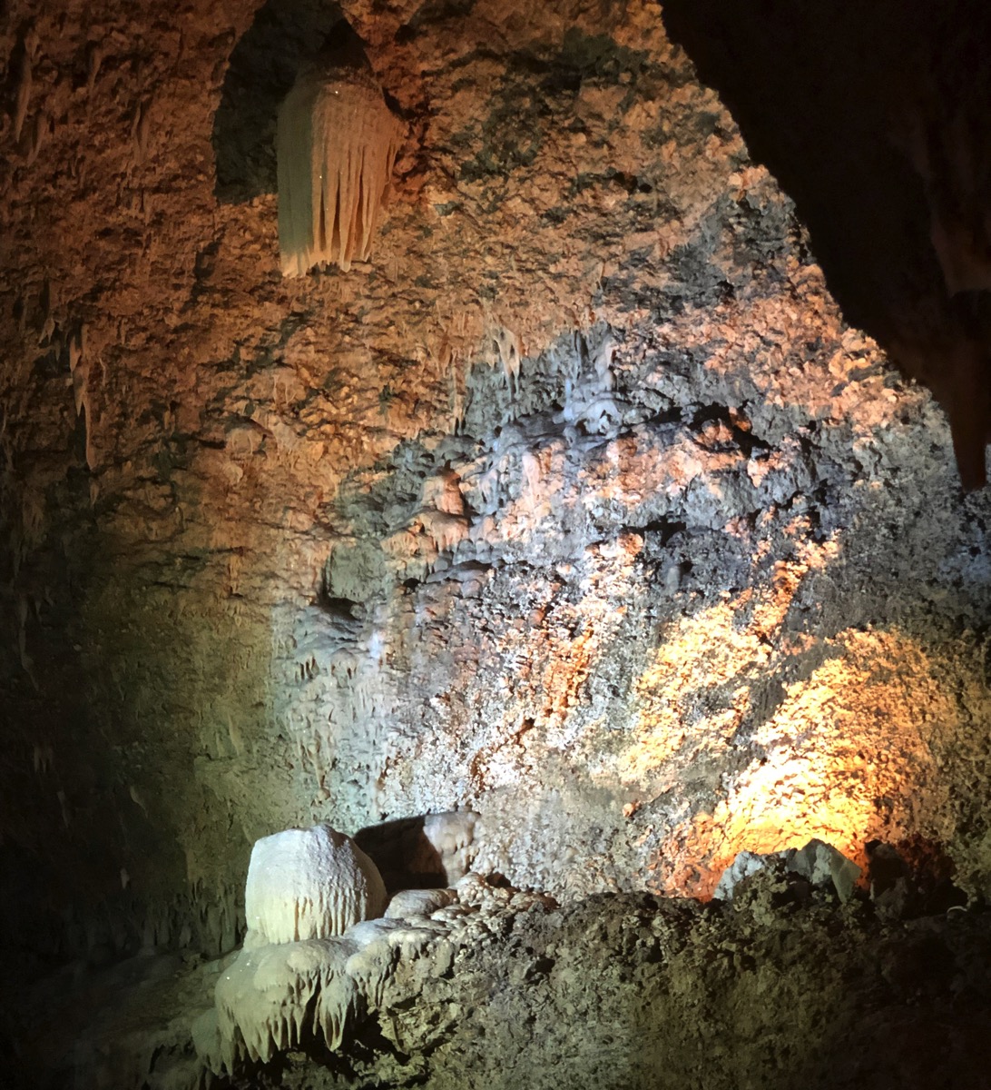 view of Harrison's cave in the dark with mood lighting